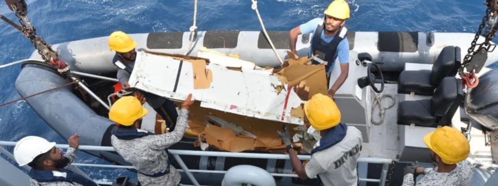 5 Crew Remain Missing After Plane Wreckage Found